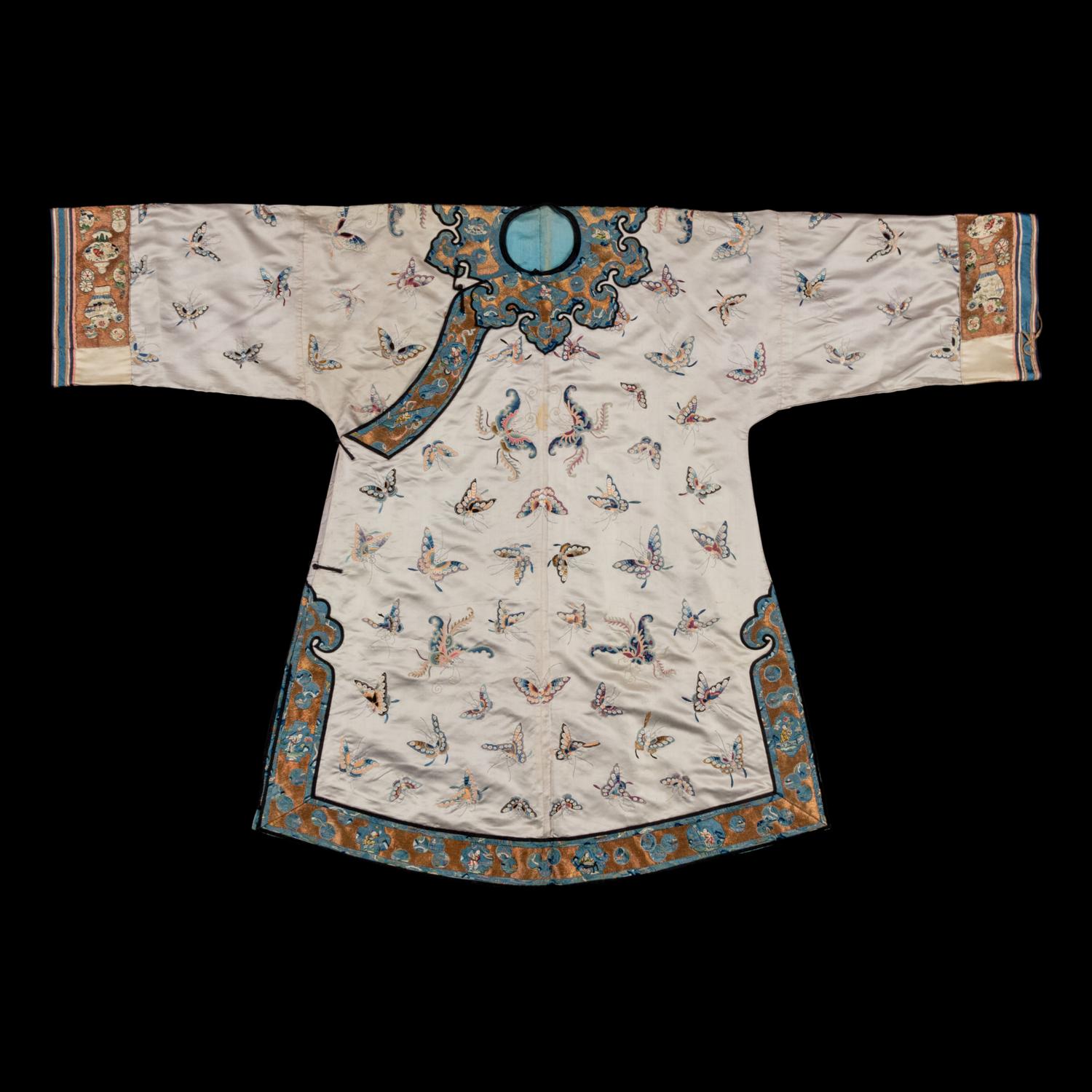 A Chinese Pale Blue Ground Embroidered Silk 'Butterfly' Lady's Informal Robe, Late Qing/Republic Period 晚清/民國 月白緞地百蝶紋女襖