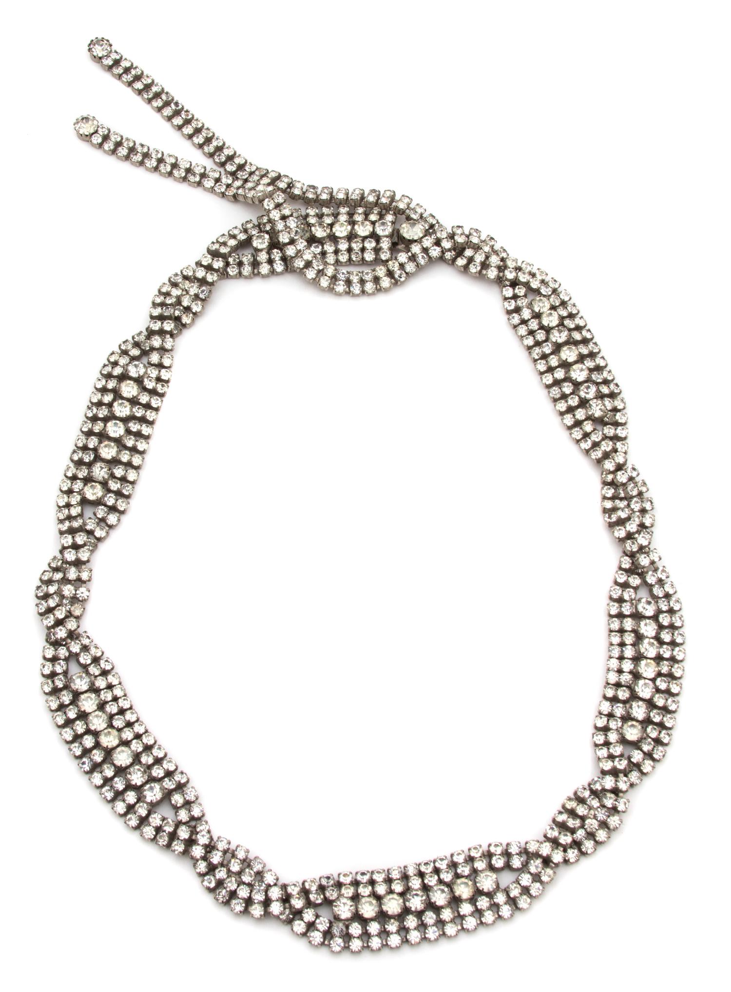 A Christian Dior Clear Rhinestone Belt, Belt: 27" x 1";Tassel: 5.5".