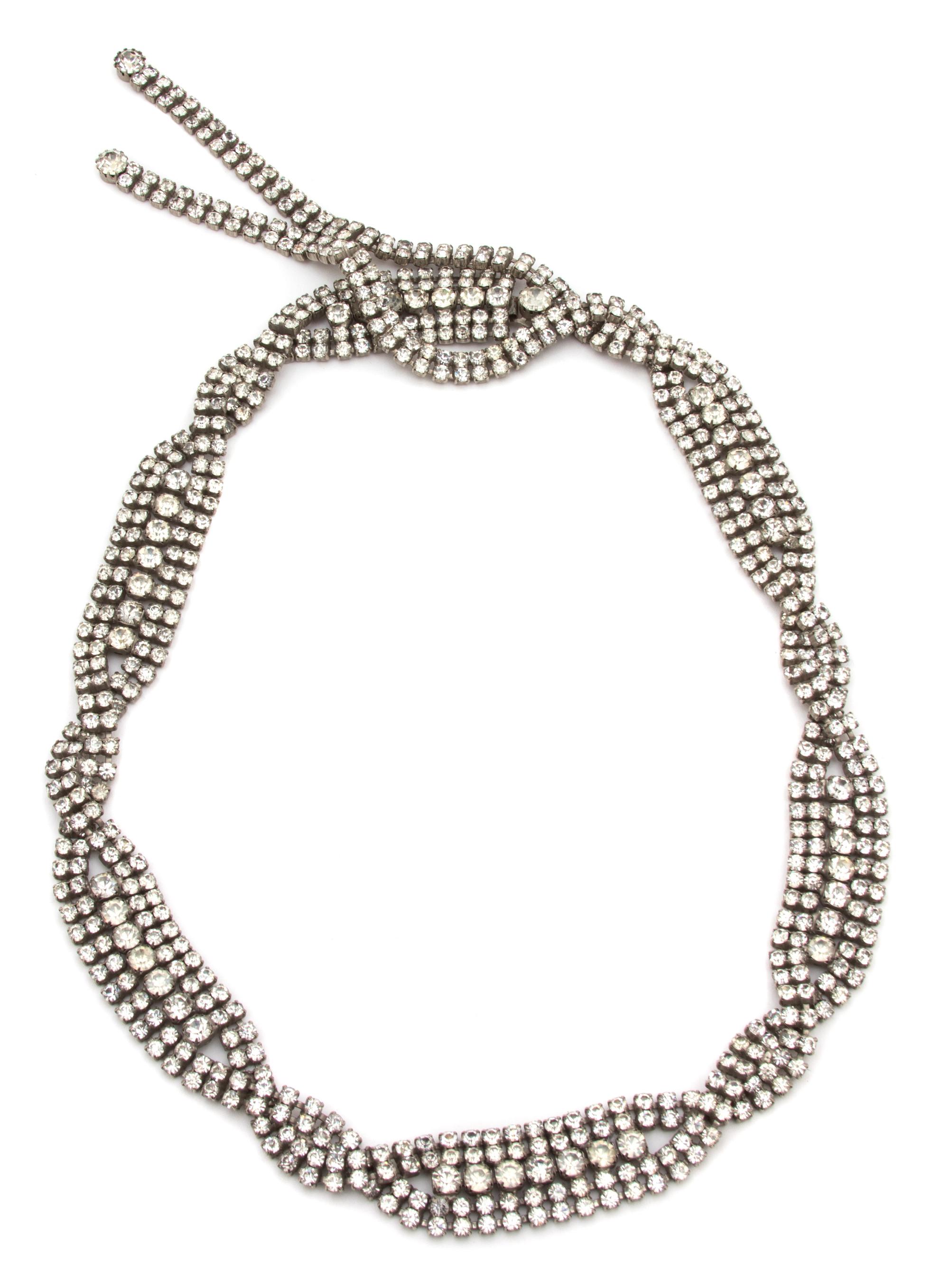 A Christian Dior Clear Rhinestone Belt, Belt: 27" x 1";Tassel: 5.5".
