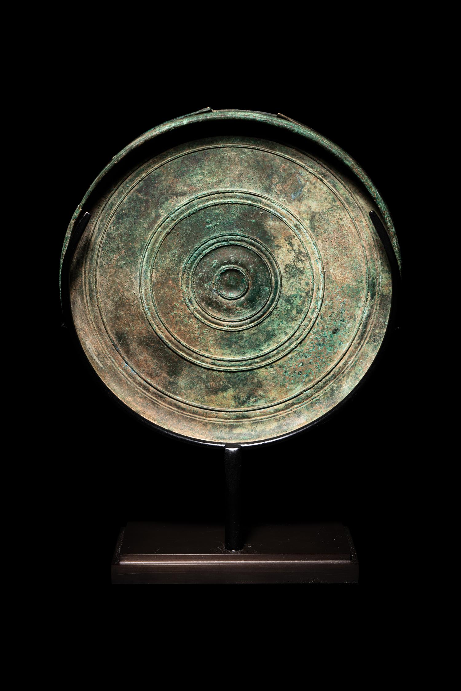 A Greek Bronze Box Mirror with Pan and Eros