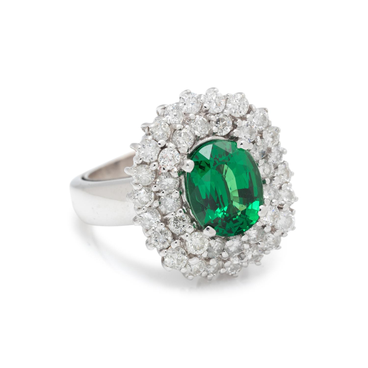 TSAVORITE GARNET AND DIAMOND RING