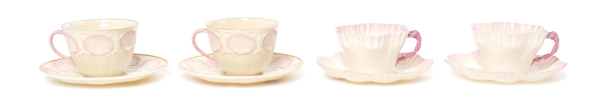 Two Pairs of Belleek Porcelain Cups and Saucers, EARLY 20TH CENTURY, ONE PAIR POSSIBLY EARLIER, Height of first 2 1/2 inches. — EARLY 20TH CENTURY, ONE PAIR POSSIBLY EARLIER,