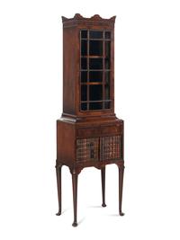 A Regency Mahogany and Faux-Book Decorated Vitrine Cabinet on Stand