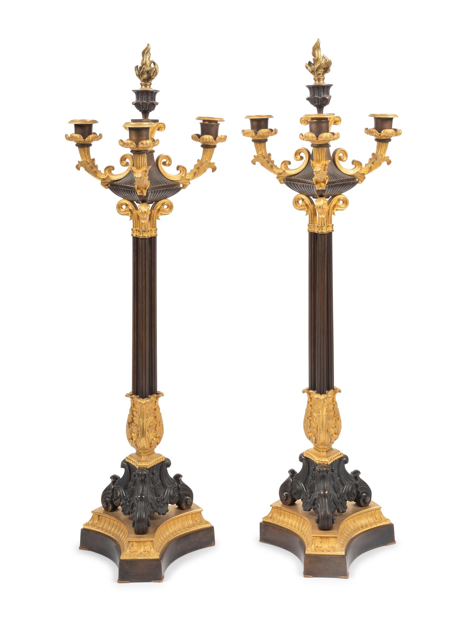 A Pair of Louis Philippe Style Gilt and Patinated Bronze Three-Light Candelabra