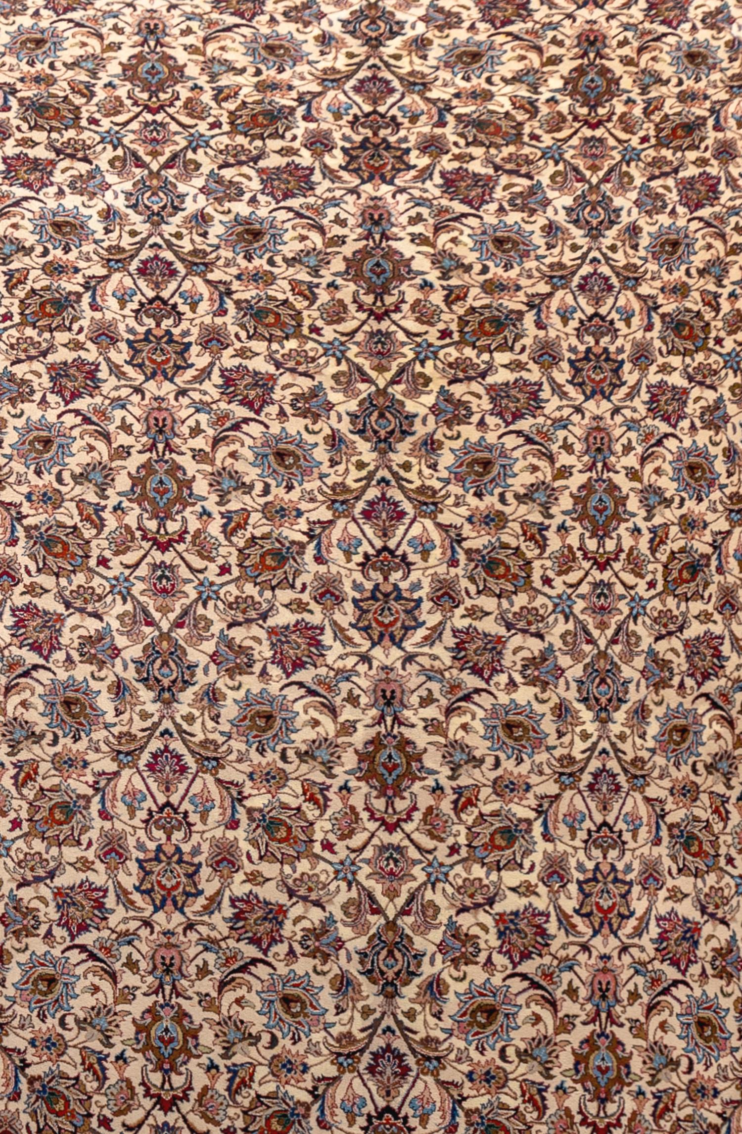 A Signed Persian Meshed Wool Rug