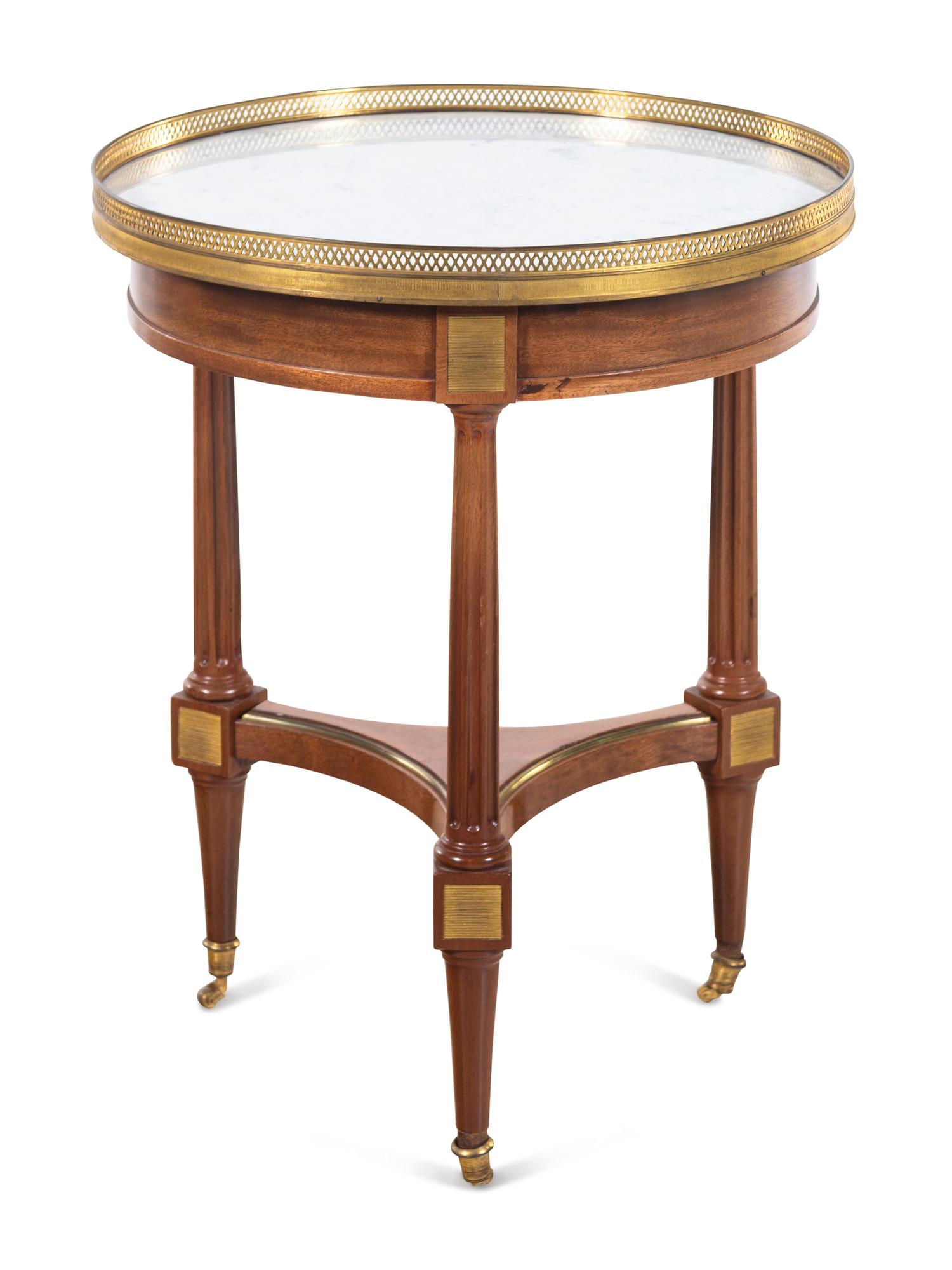 A Louis XVI Style Gilt Metal Mounted Mahogany Marble-Top Bouillotte Table