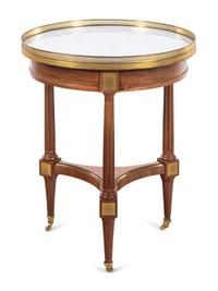 A Louis XVI Style Gilt Metal Mounted Mahogany Marble-Top Bouillotte Table