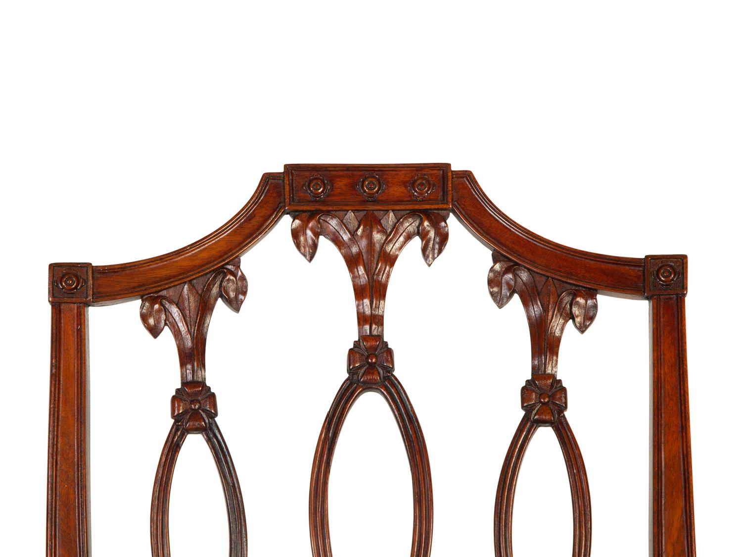 A Pair of Federal Carved Mahogany Side Chairs