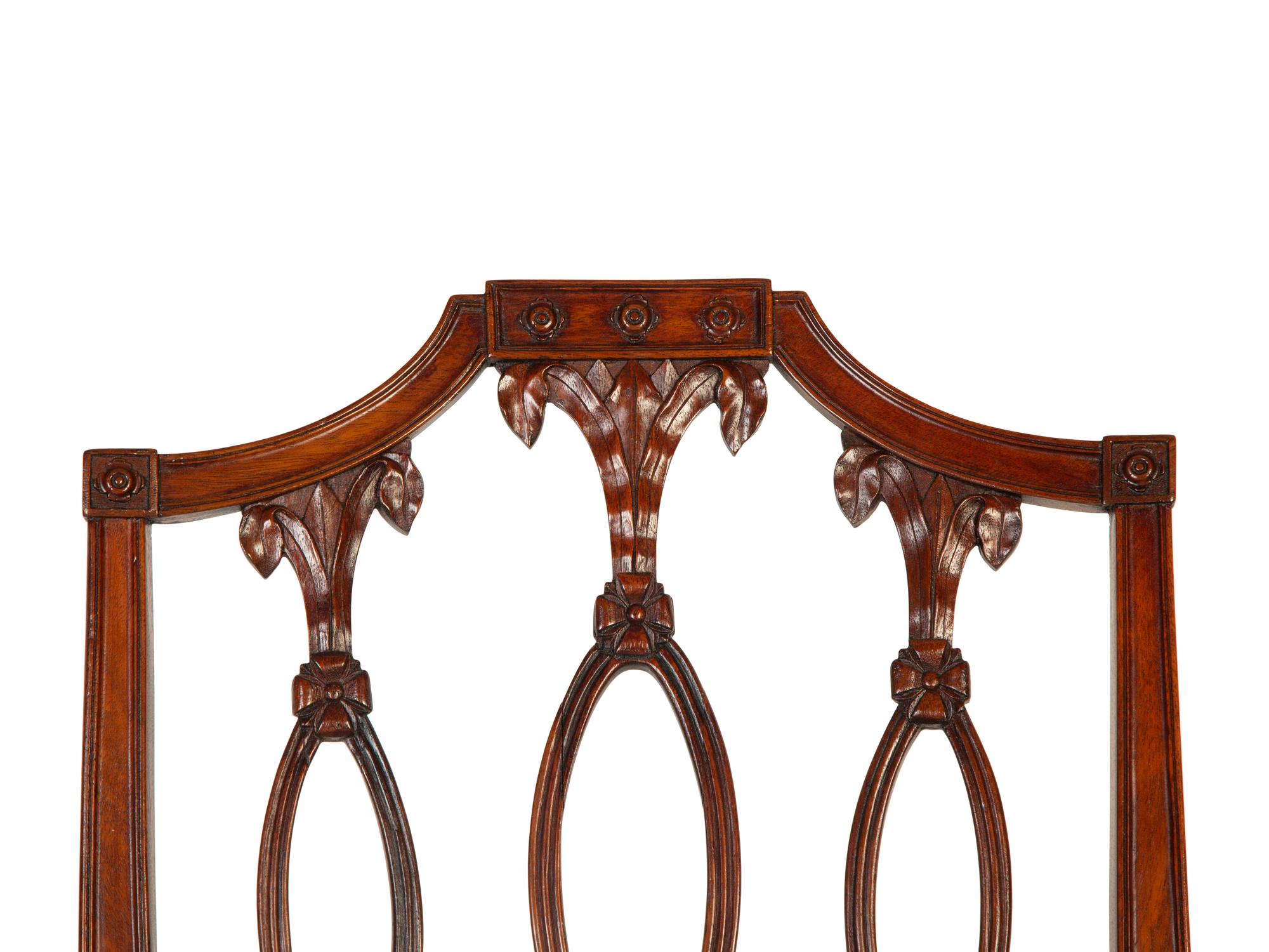 A Pair of Federal Carved Mahogany Side Chairs