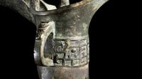 A Chinese Archaistic Bronze Jue Drinking Vessel