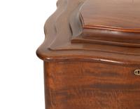 A Regina Mahogany Serpentine Cabinet Music Box