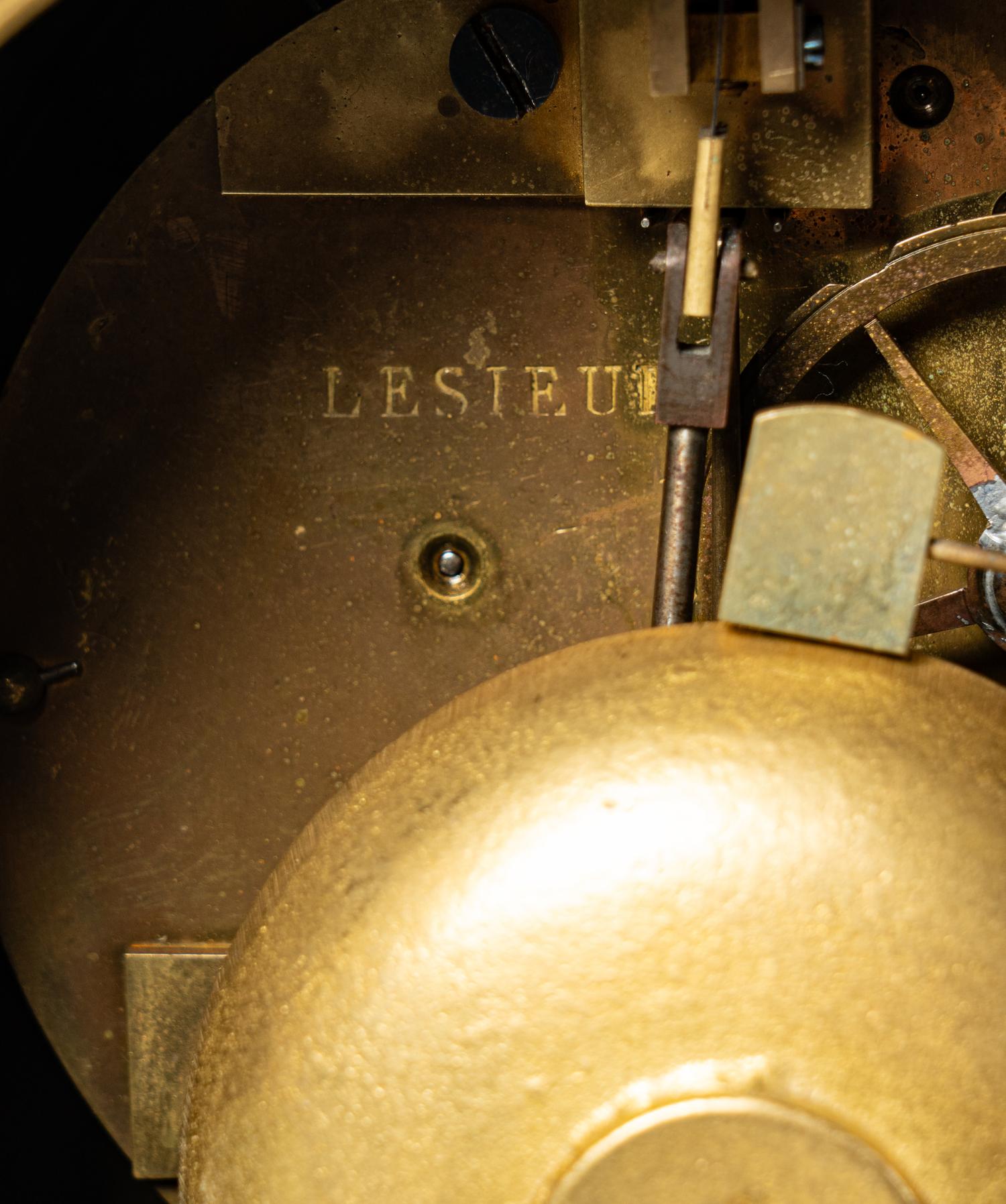 A Restauration Gilt and Patinated Bronze Mantel Clock with Orpheus and a Lyre