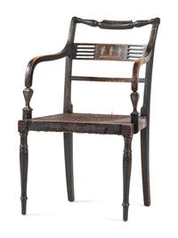 A Classical Black and Gilt Decorated Cane-Upholstered Armchair