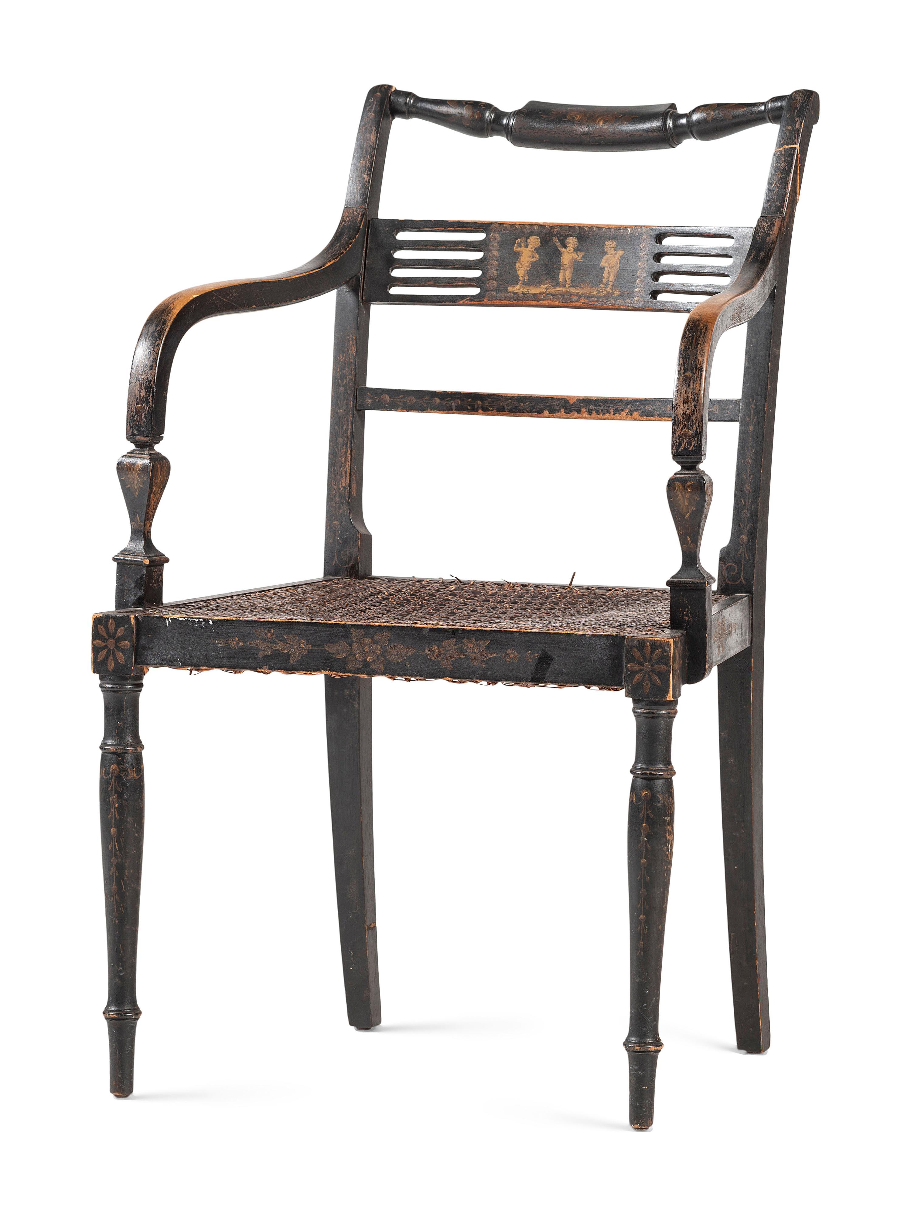 A Classical Black and Gilt Decorated Cane-Upholstered Armchair