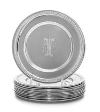 A Set of Twelve American Silver Bread Plates, 20th Century, each with an engraved SNW monogram at the center.