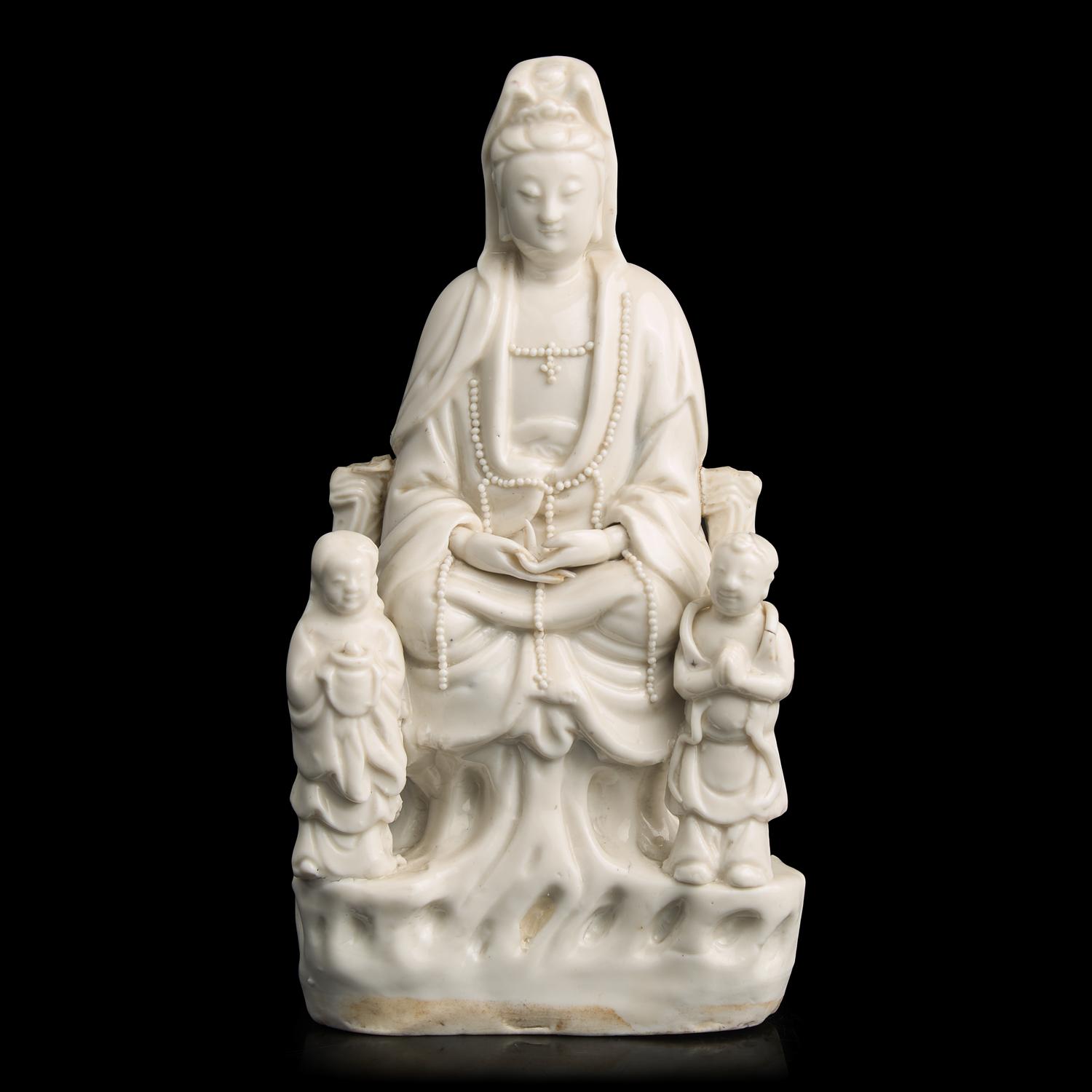 A Chinese Blanc de Chine Figure of Guanyin,17th/18th Century 明末清初 德化白瓷觀音坐像