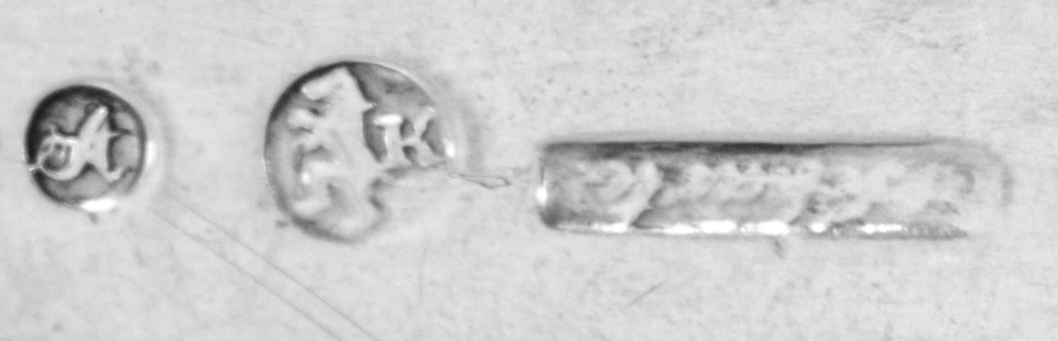 A Scottish George III Silver Serving Ladle, William Davie, Edinburgh, 1780, the Old English handle having a bright-cut wrigglework bord