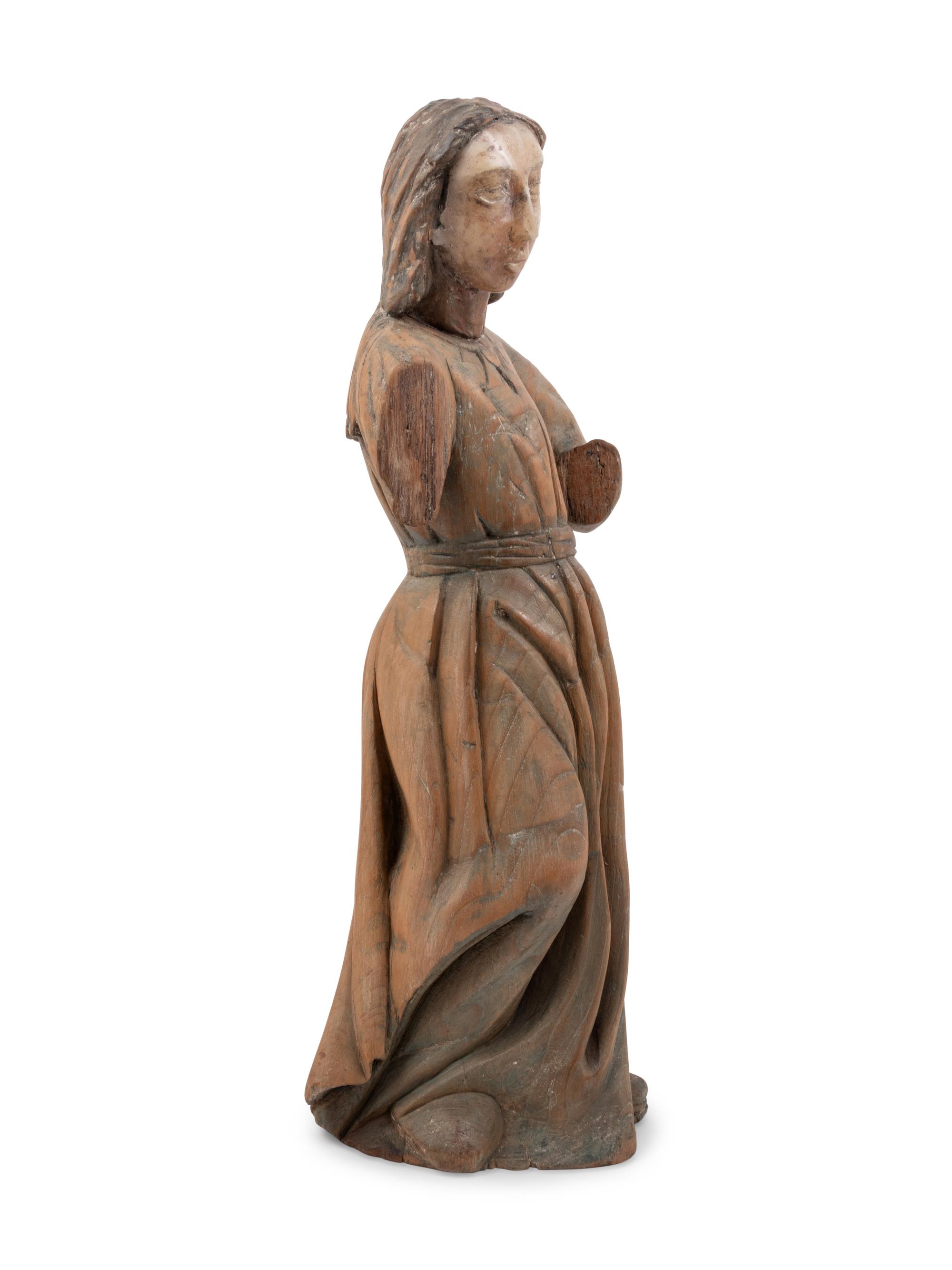 A Mexican Colonial Carved Wood and Alabaster Figure of a Saint