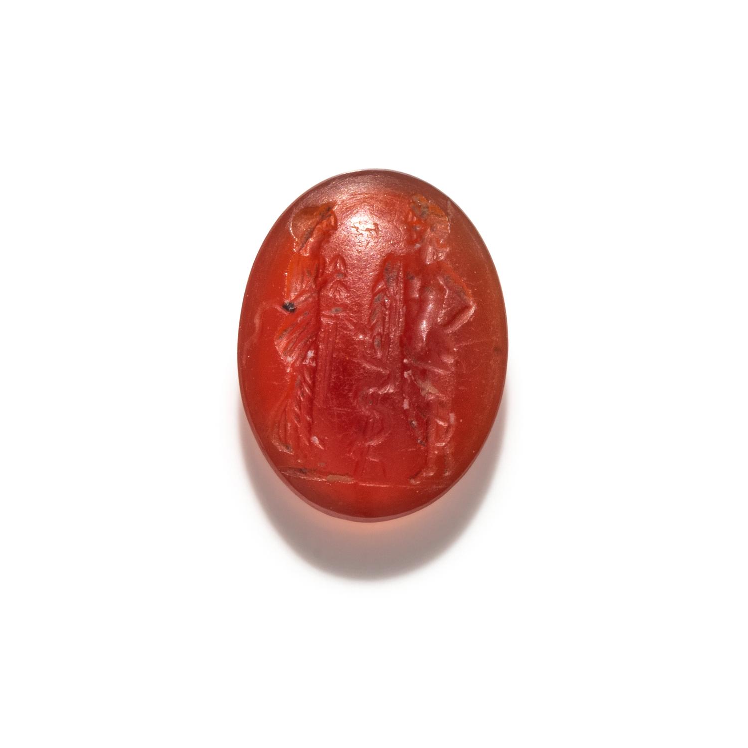 A Roman Carnelian Ring Stone with the God Asclepius and a Satyr