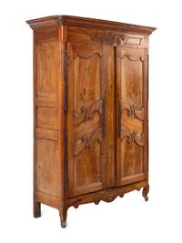 A French Provincial Walnut and Fruitwood Armoire