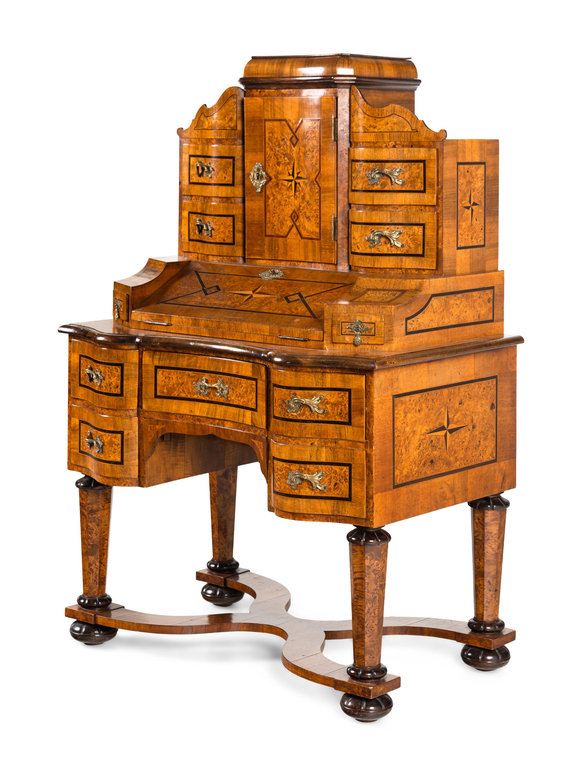 An Austrian Burlwood and Walnut Tabernacle Bureau