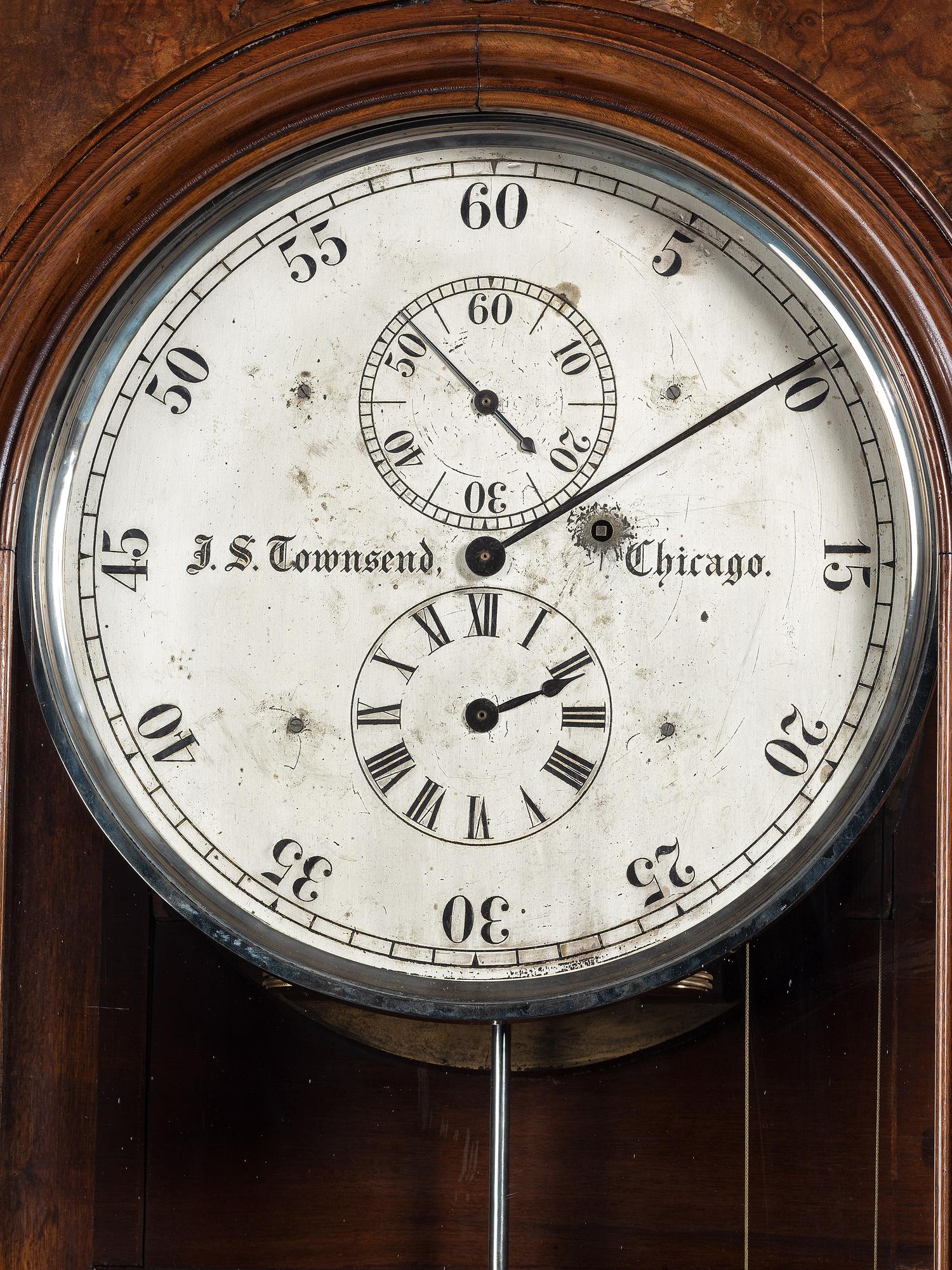 An Impressive Renaissance Revival Carved Walnut Tall Case Regulator Clock