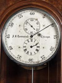 An Impressive Renaissance Revival Carved Walnut Tall Case Regulator Clock