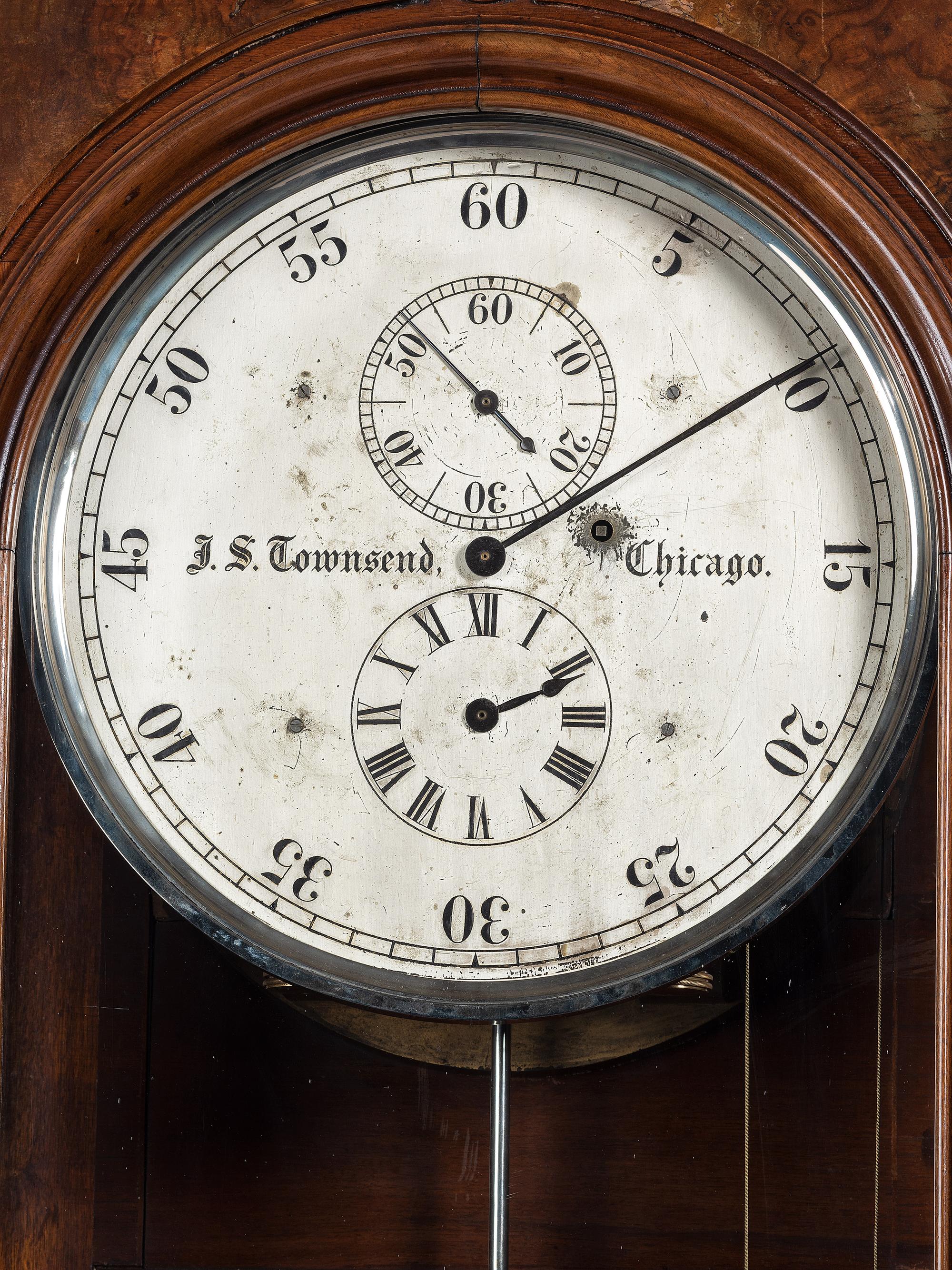 An Impressive Renaissance Revival Carved Walnut Tall Case Regulator Clock