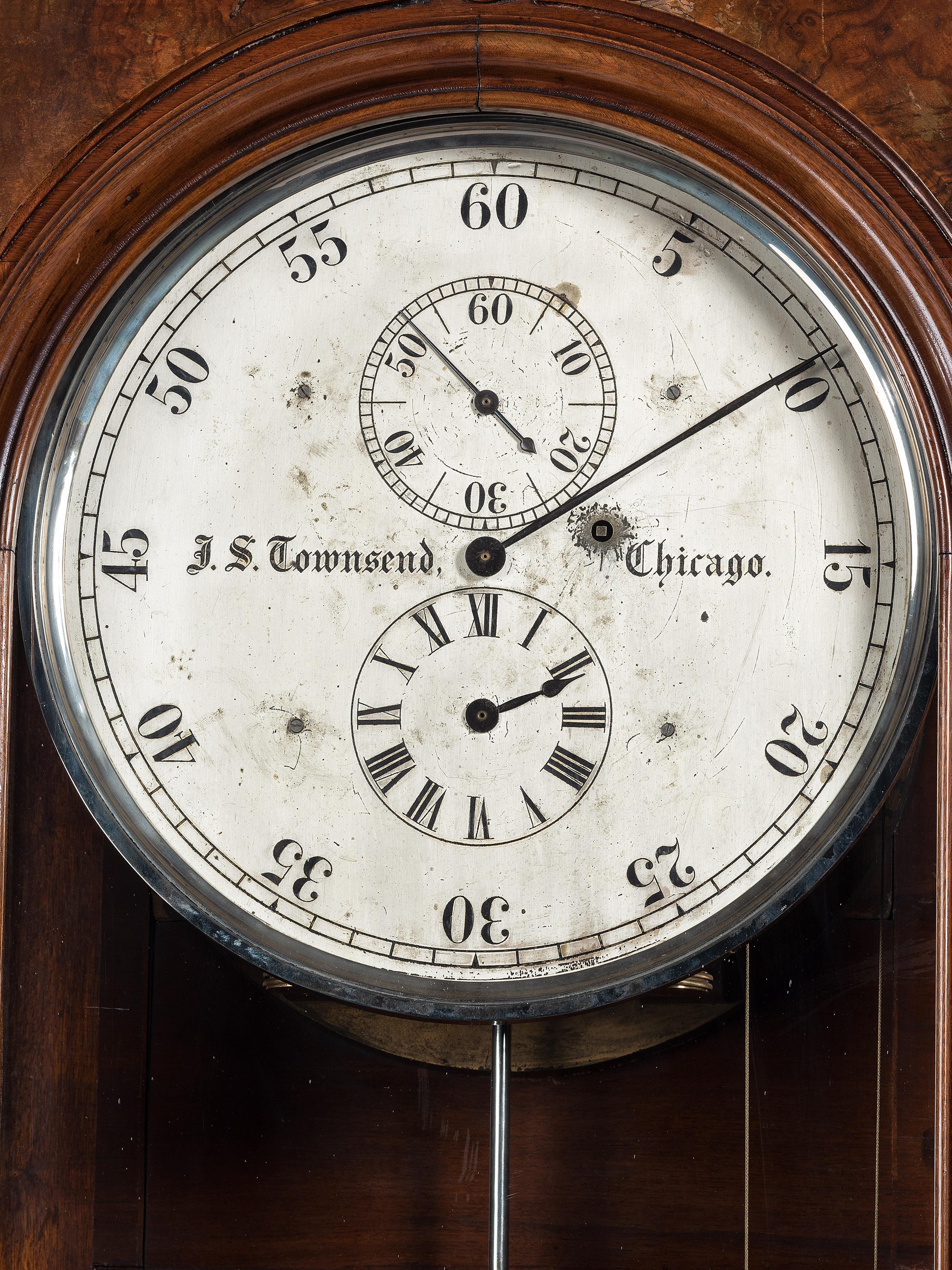 An Impressive Renaissance Revival Carved Walnut Tall Case Regulator Clock