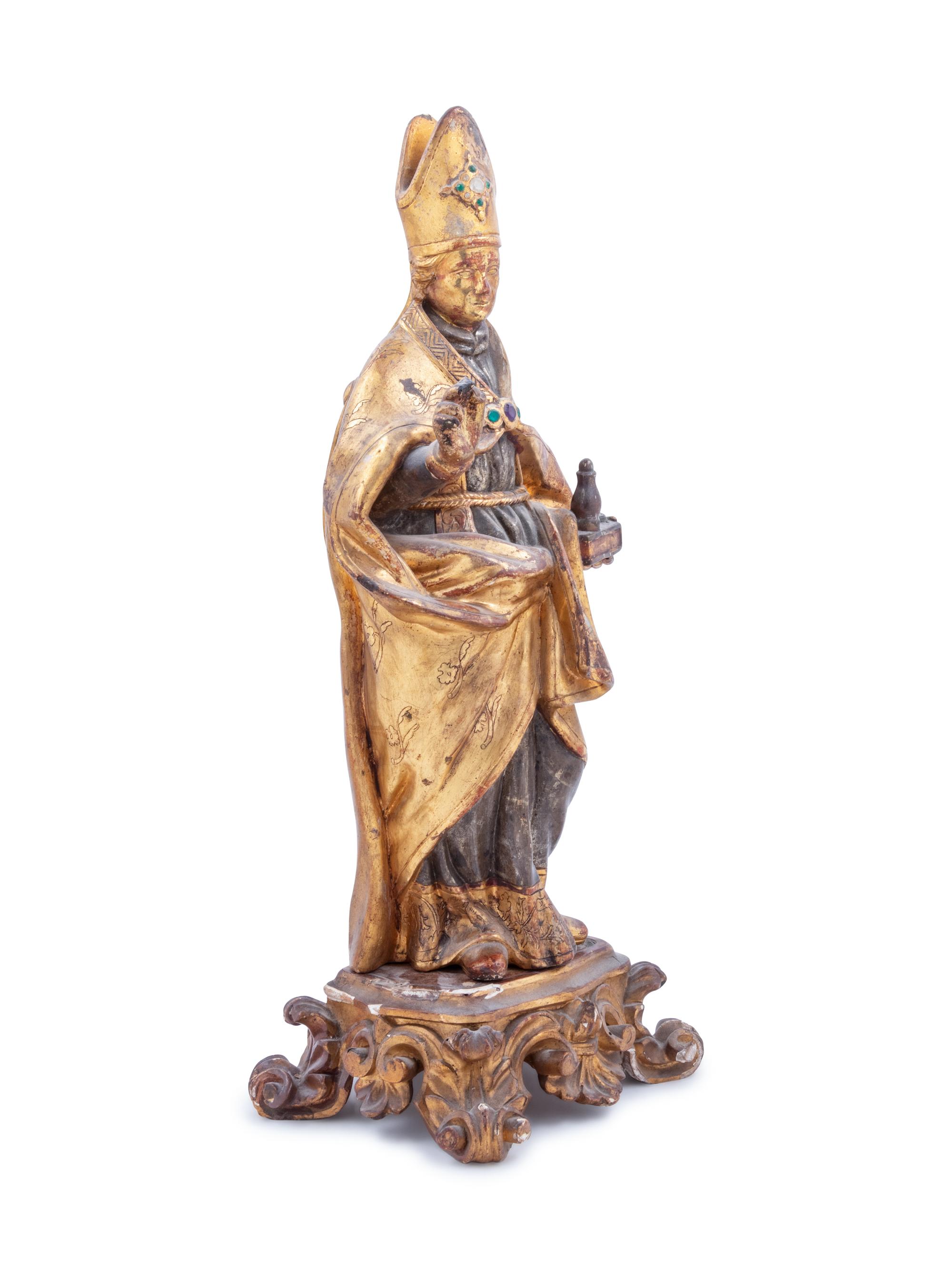 A Continental Painted, Parcel Gilt and Gem-Inset Figure of a Saint