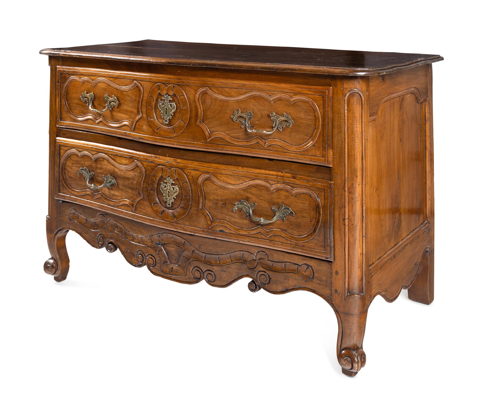 A Louis XV Walnut Commode