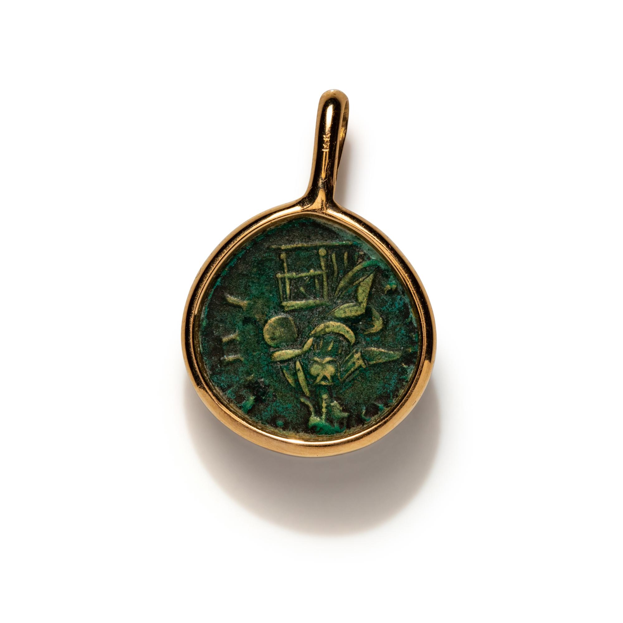 A Greek Bronze Coin with the Goddess Athena — Set in a gold pendant