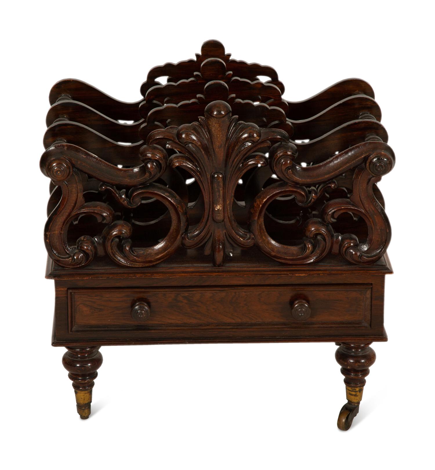 A Late Regency Carved Mahogany Canterbury
