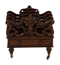 A Late Regency Carved Mahogany Canterbury