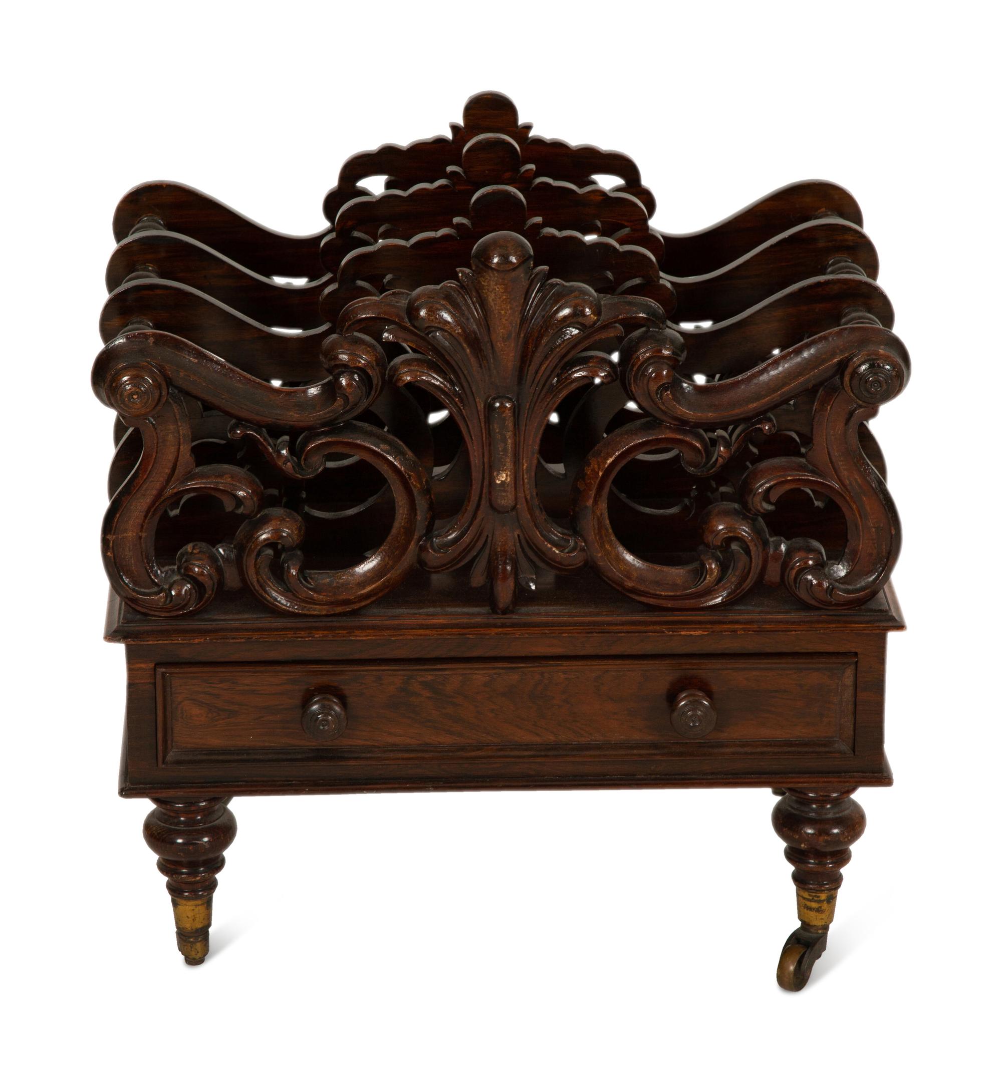 A Late Regency Carved Mahogany Canterbury
