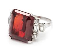 A Platinum, Garnet and Diamond Ring, 9.30 dwts.