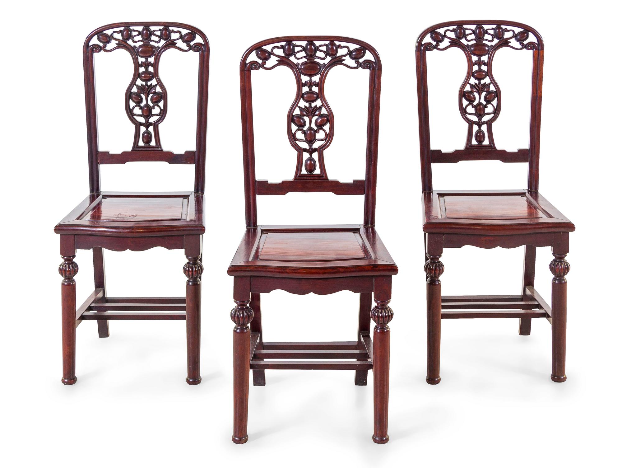A Set of Chinese Export Hardwood Round Table and Four Chairs
