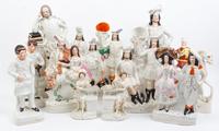 A Collection of Staffordshire Figures and Spill Vases Height of tallest 18 inches.