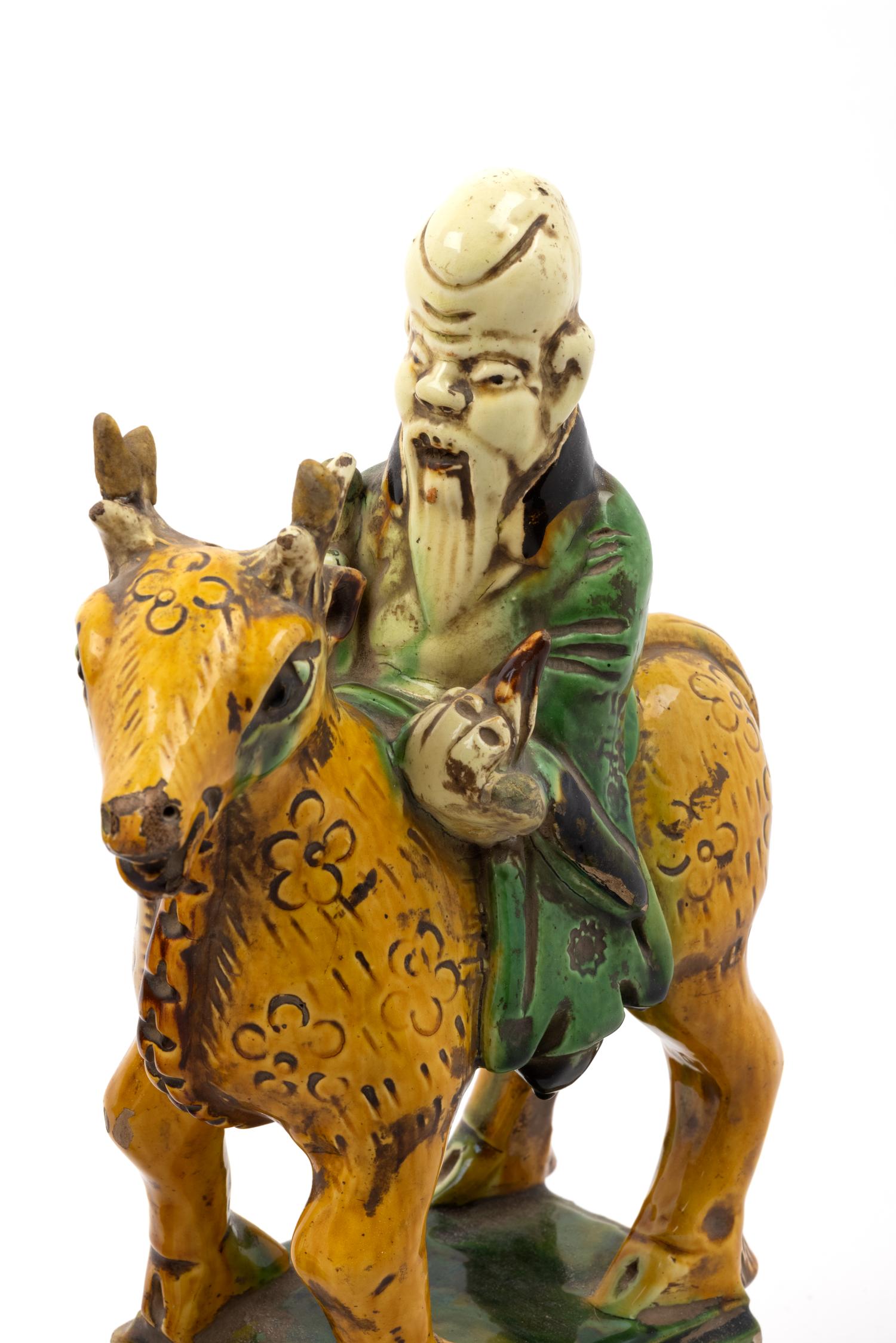 A Pair of Chinese Sancai Glazed Pottery Shoulou Form Censers