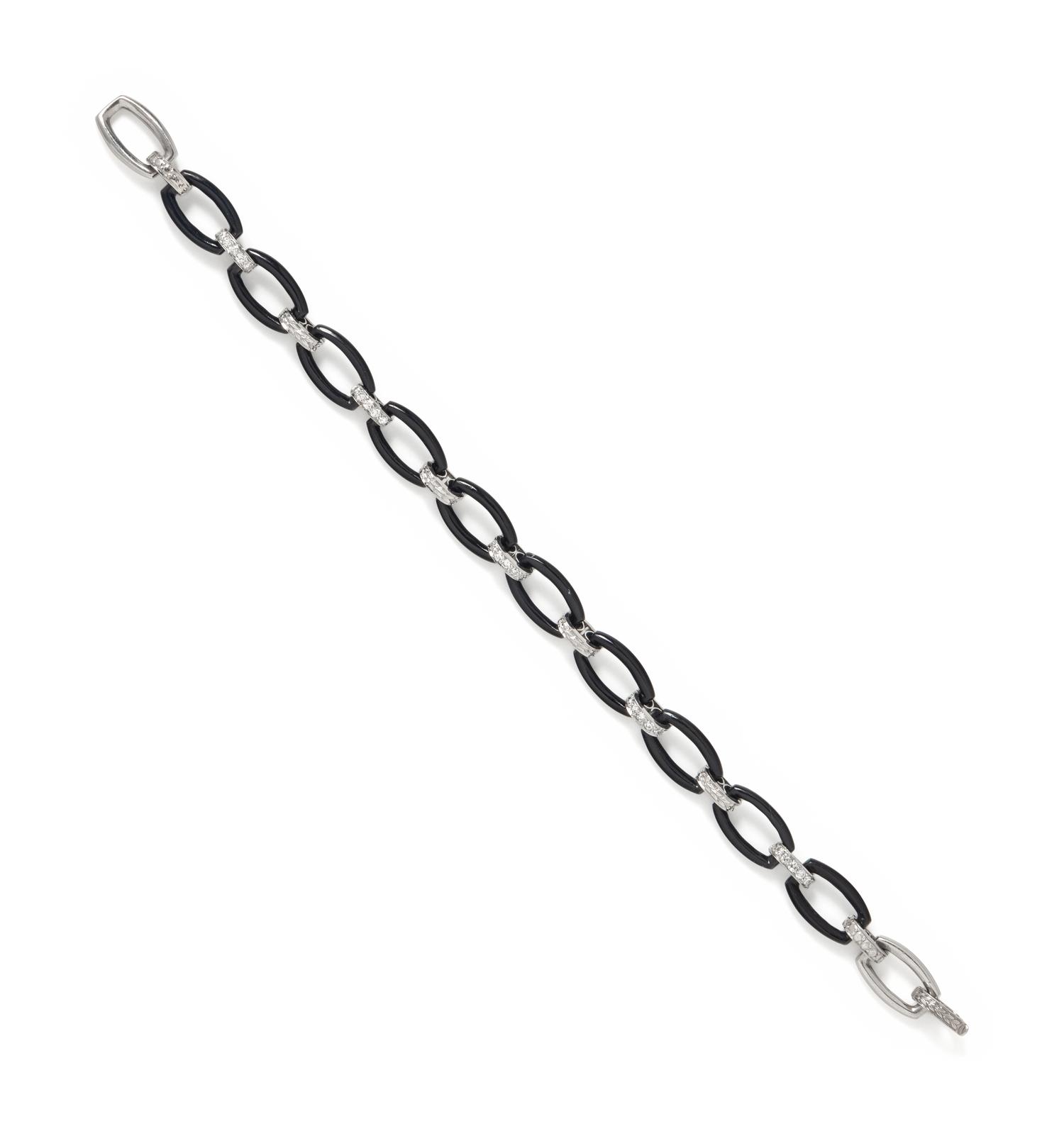 ART DECO, PLATINUM, ONYX AND DIAMOND BRACELET