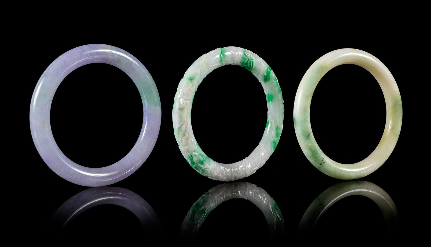 Three Jadeite Bangles Diameter of largest 3 3/8 inches.