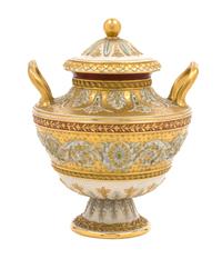 A Wedgwood Five-Color Porcelain Urn Height 7 inches.