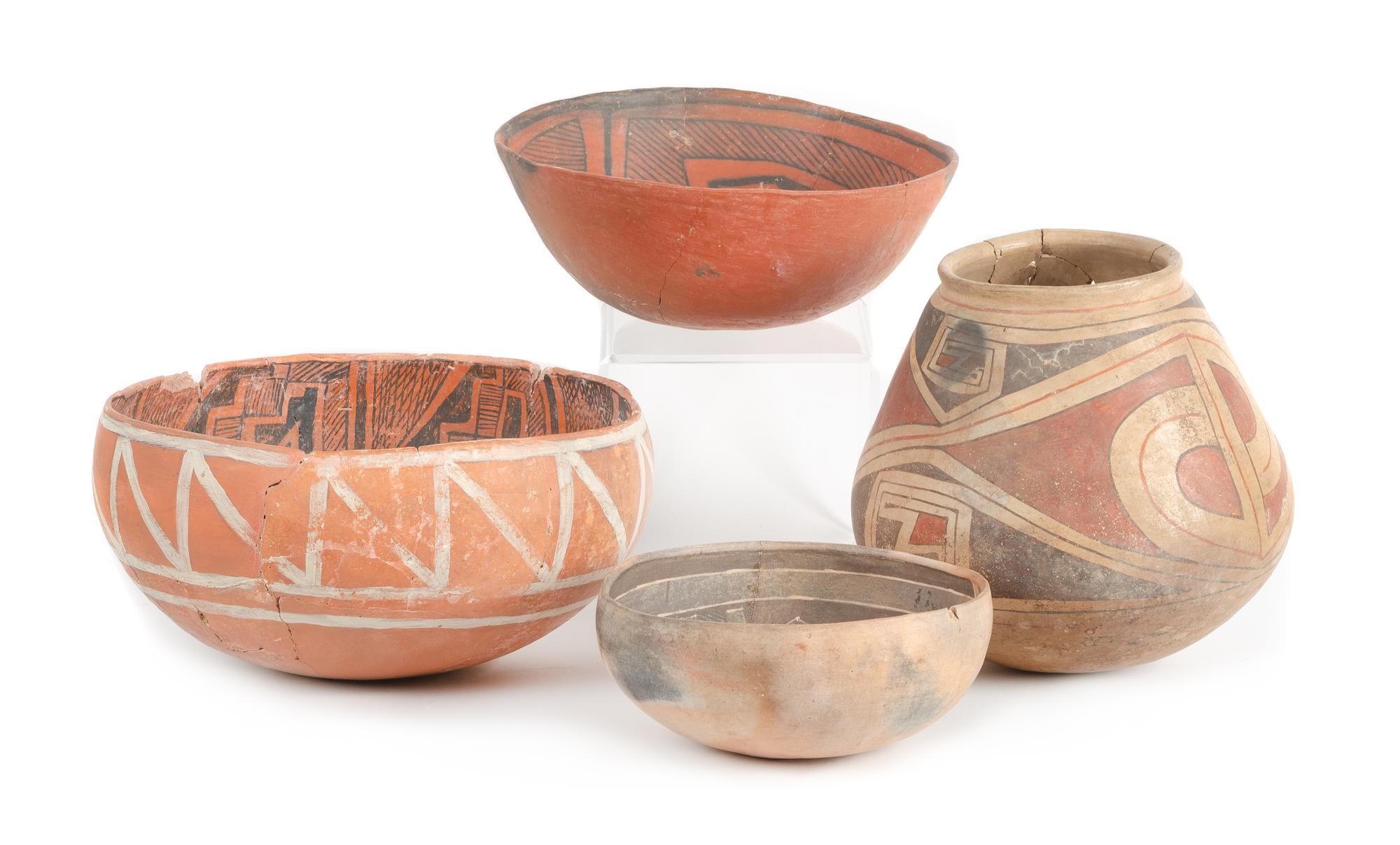 Group of Four Prehistoric Pots Height of largest 9 1/2 inches