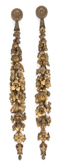 A Pair of Italian Floral Carved Giltwood Wall Mounts Length 31 inches. — 19TH CENTURY