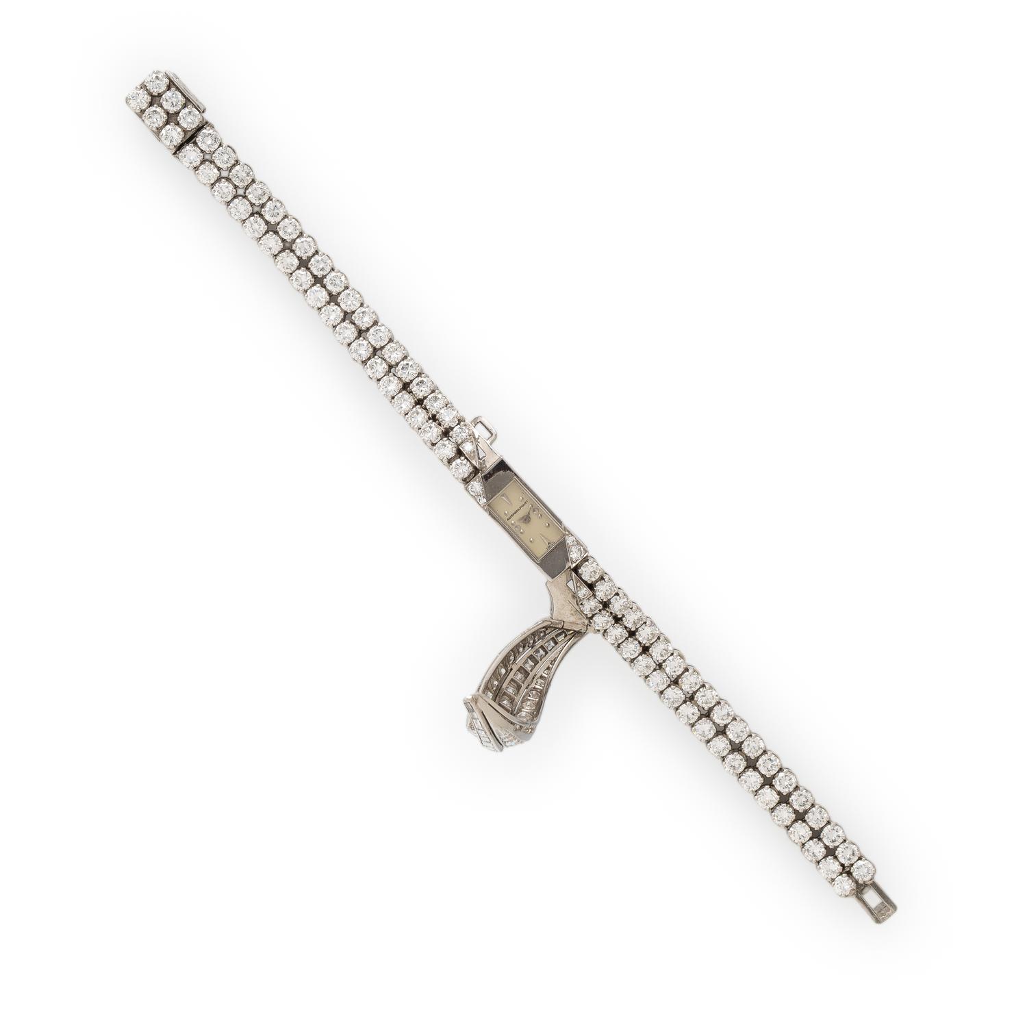 AUDEMARS PIGUET, DIAMOND AND PLATINUM SURPRISE WATCH