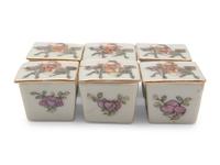 A Set of Six Small Chinese Famille Rose Porcelain Covered Boxes