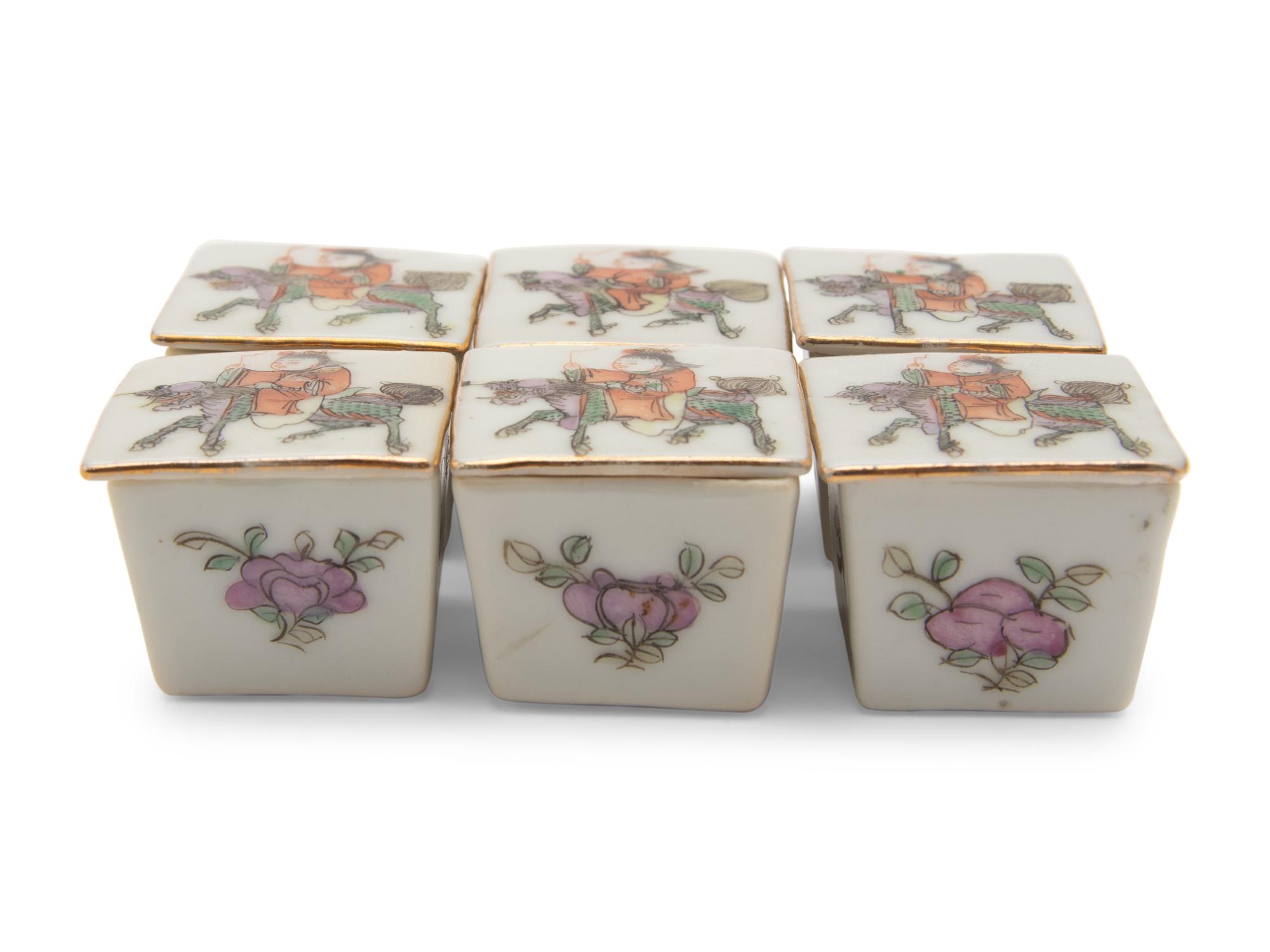 A Set of Six Small Chinese Famille Rose Porcelain Covered Boxes
