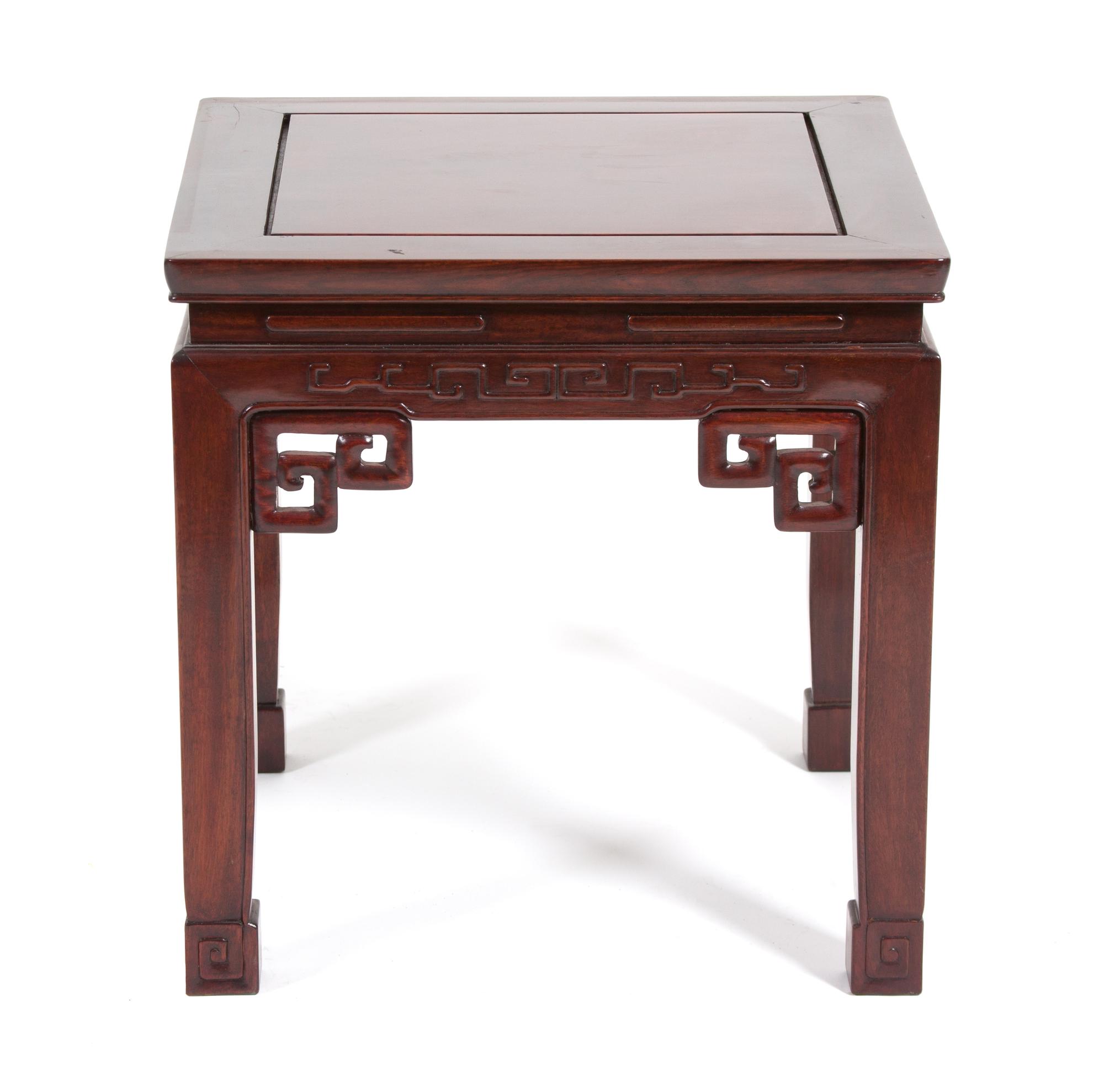 A Chinese Carved Wood Side Table Height 18 x width 18 x depth 18 inches. — 20TH CENTURY