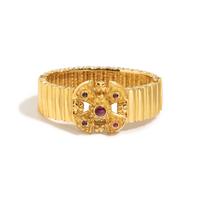 YELLOW GOLD AND RUBY BANGLE BRACELET