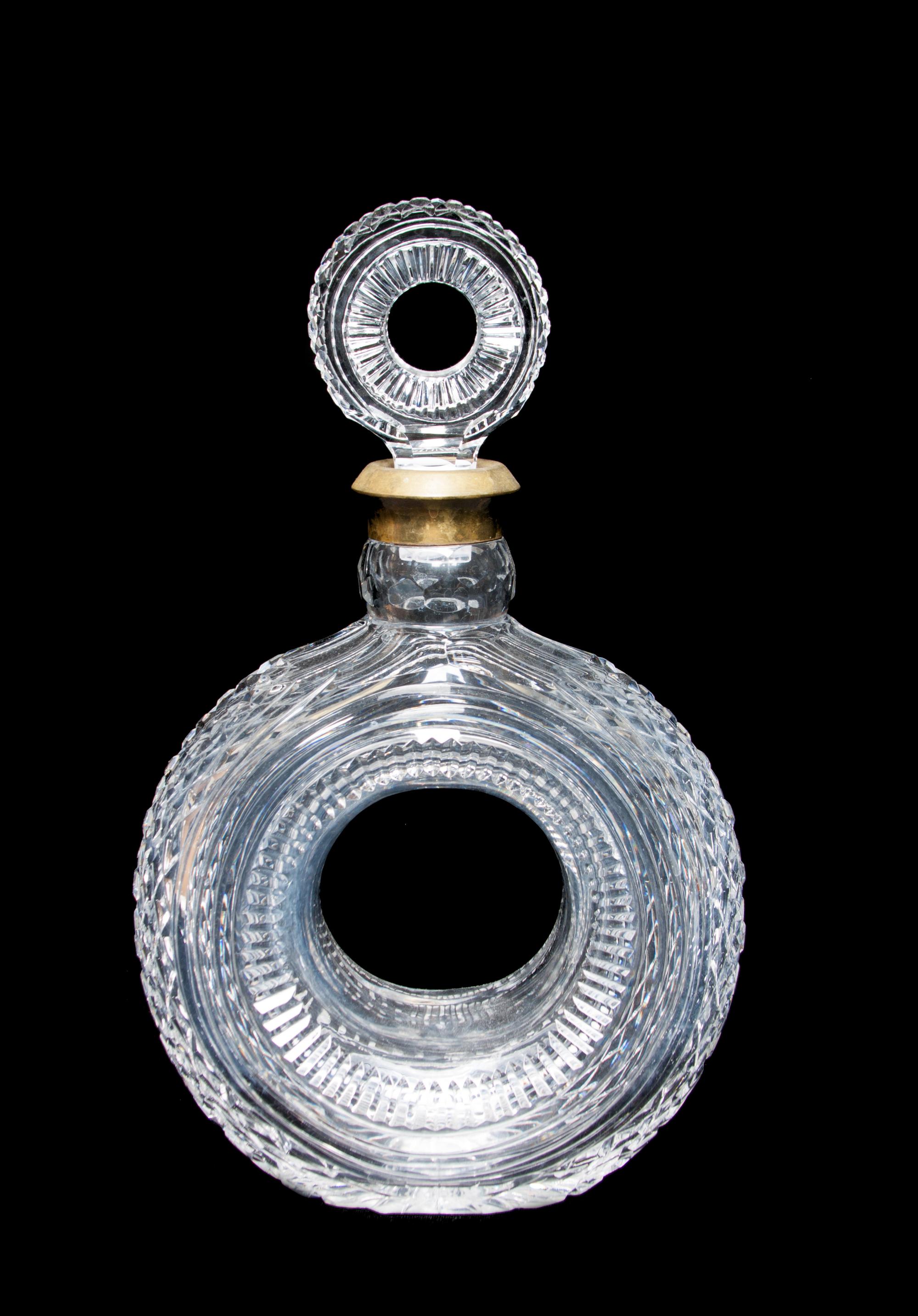 An American Cut Glass and Brass Mounted Decanter Height 10 3/4 inches.